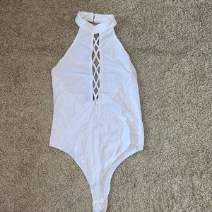 Criss cross white body suit